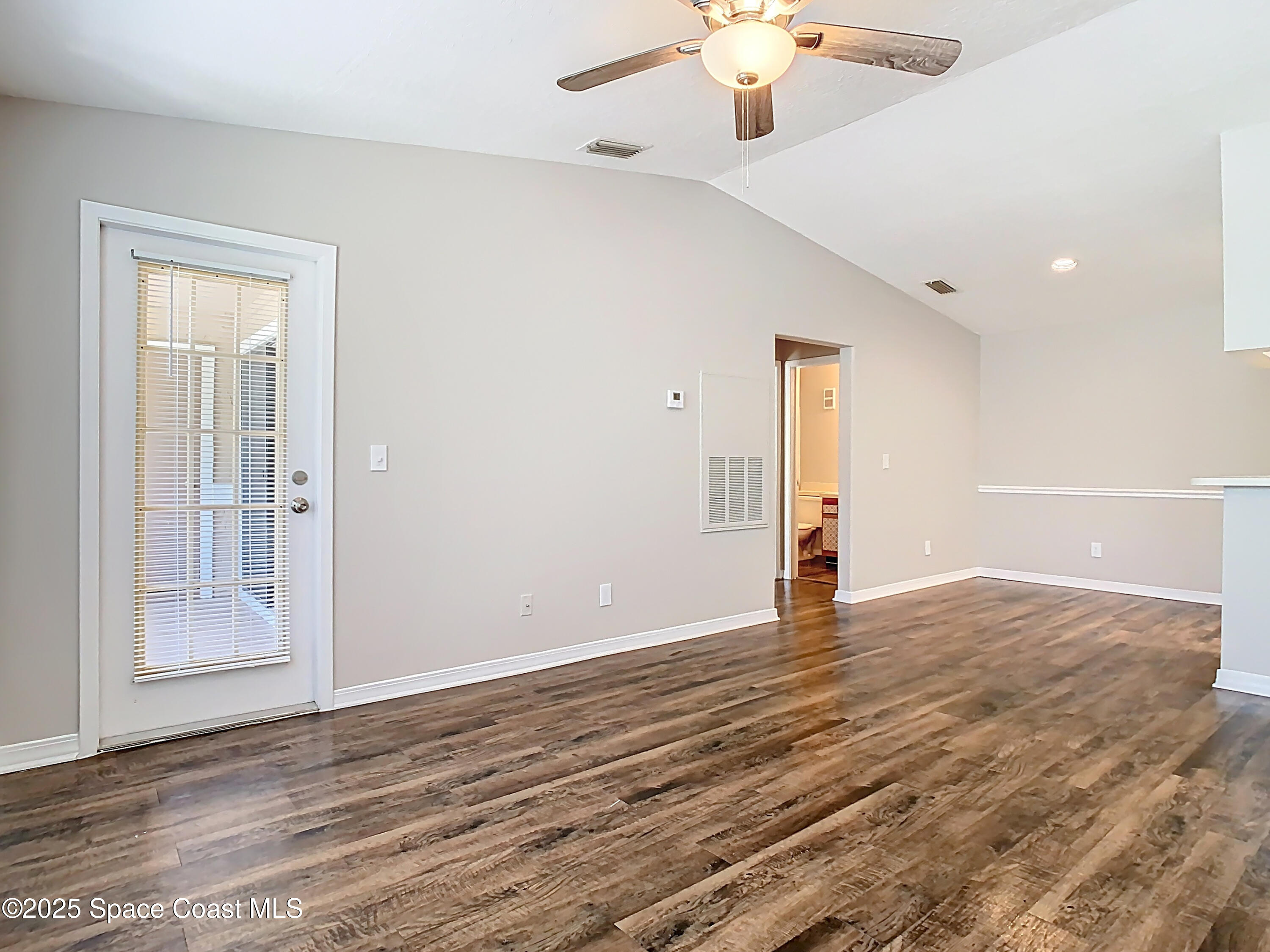 7667 North Wickham Road, Unit 721 Melbourne, FL 32940 - Photo 6 of 32 Door to patio from living area