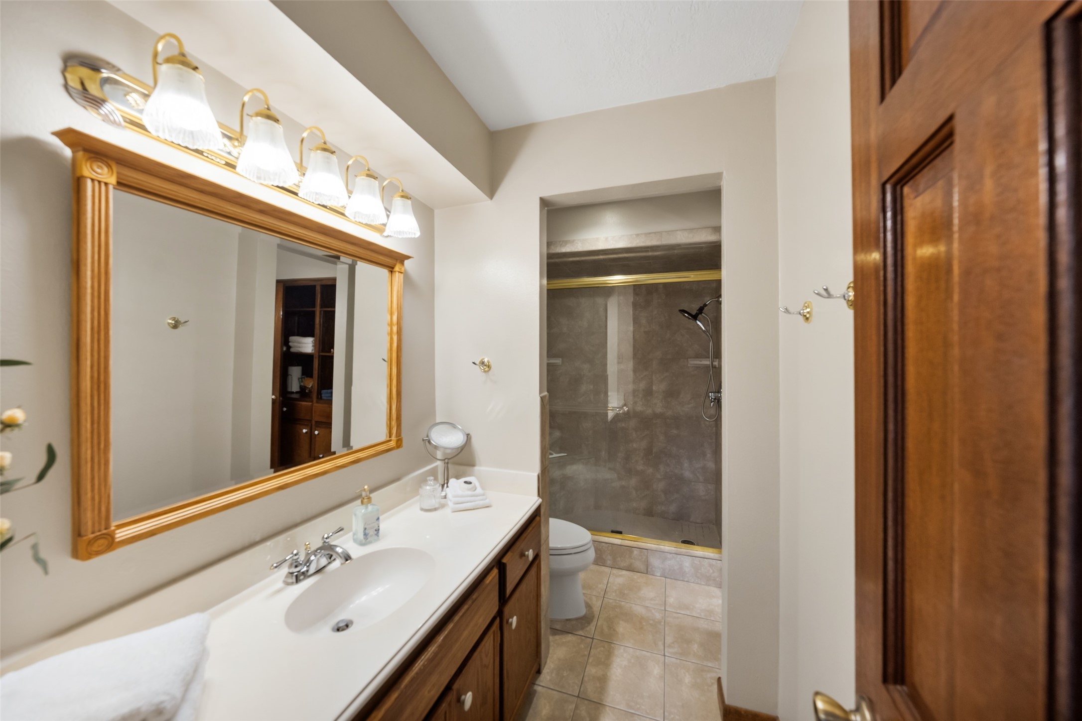 25948 Nelson Road Hempstead, TX 77445 - Photo 21 of 46 Primary bathroom featuring a spacious vanity with dual sinks, abundant counter space, and separate walk-in shower.