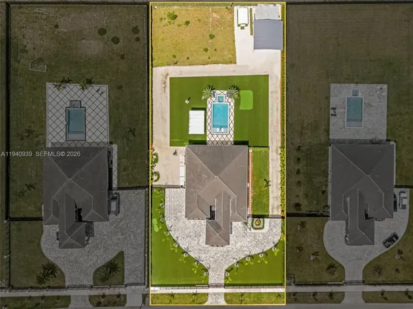 a view of swimming pool with lounge chair