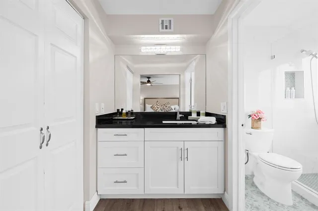 a bathroom with a sink and a toilet