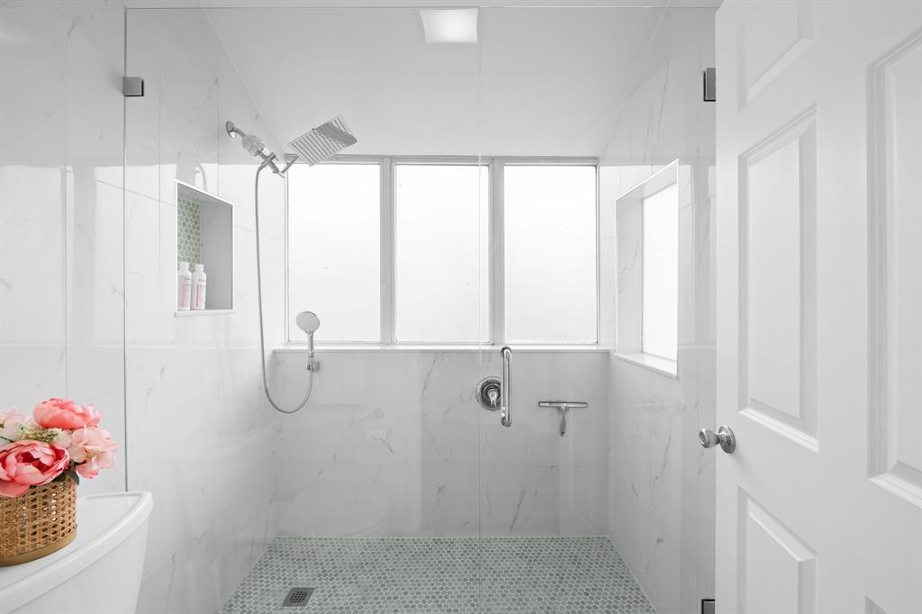 5298 Buckhead Circle, Unit 1040 Boca Raton, FL 33431 - Photo 20 of 25 a bathroom with a shower