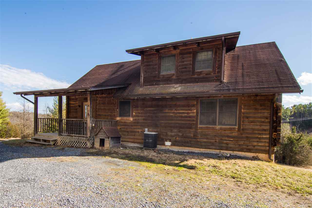919 Roman Road Mount Sidney, VA 24467 - Photo 1 of 32 a front view of a house with a yard