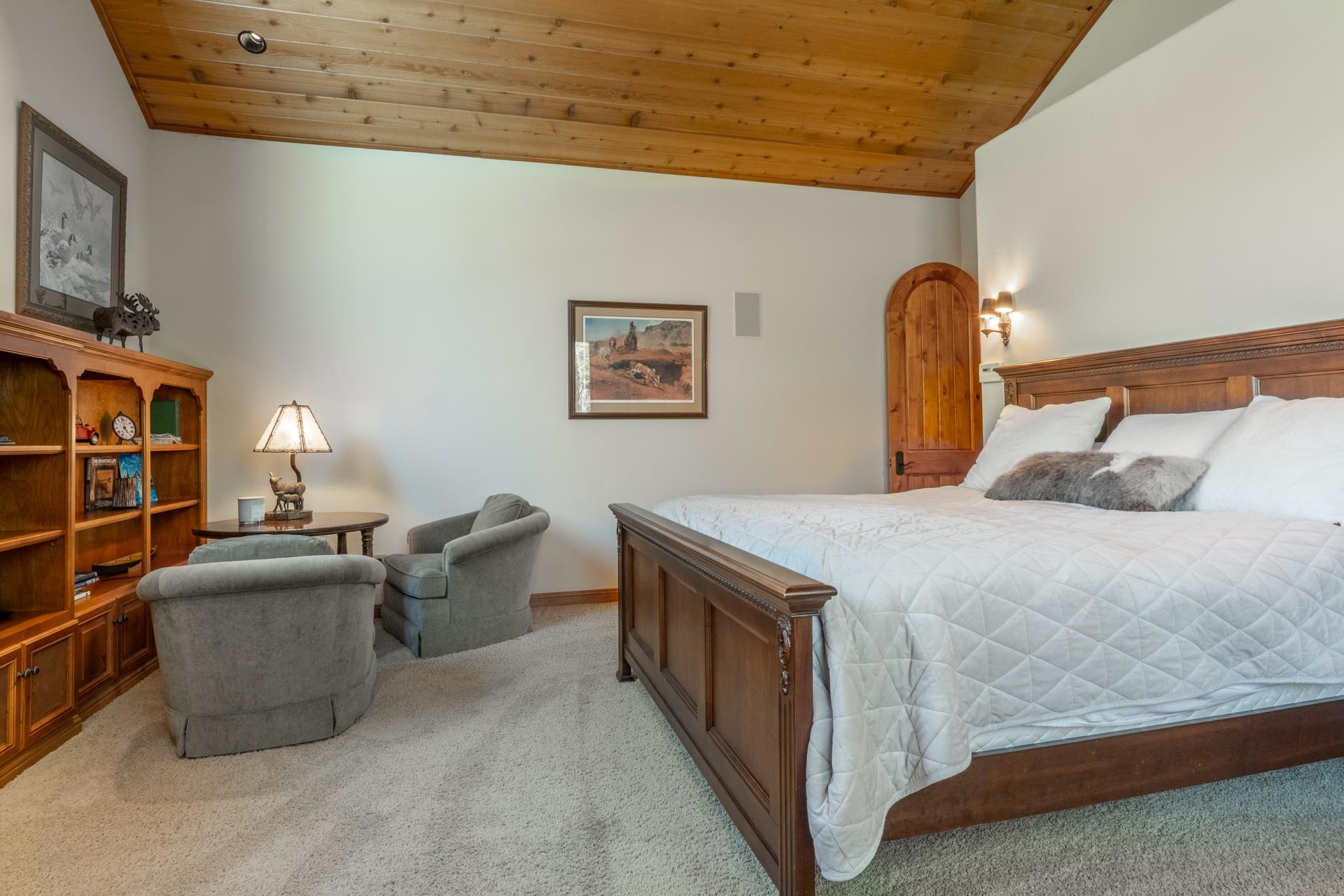 45 Skyline Road June Lake, CA 93529 - Photo 32 of 58 Vaulted wood-paneled ceiling accentuates this carpeted room