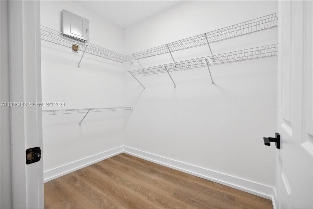 4412 Southwest 101 Drive Gainesville, FL 32608 - Photo 36 of 52 a view of a room with racks on the wall