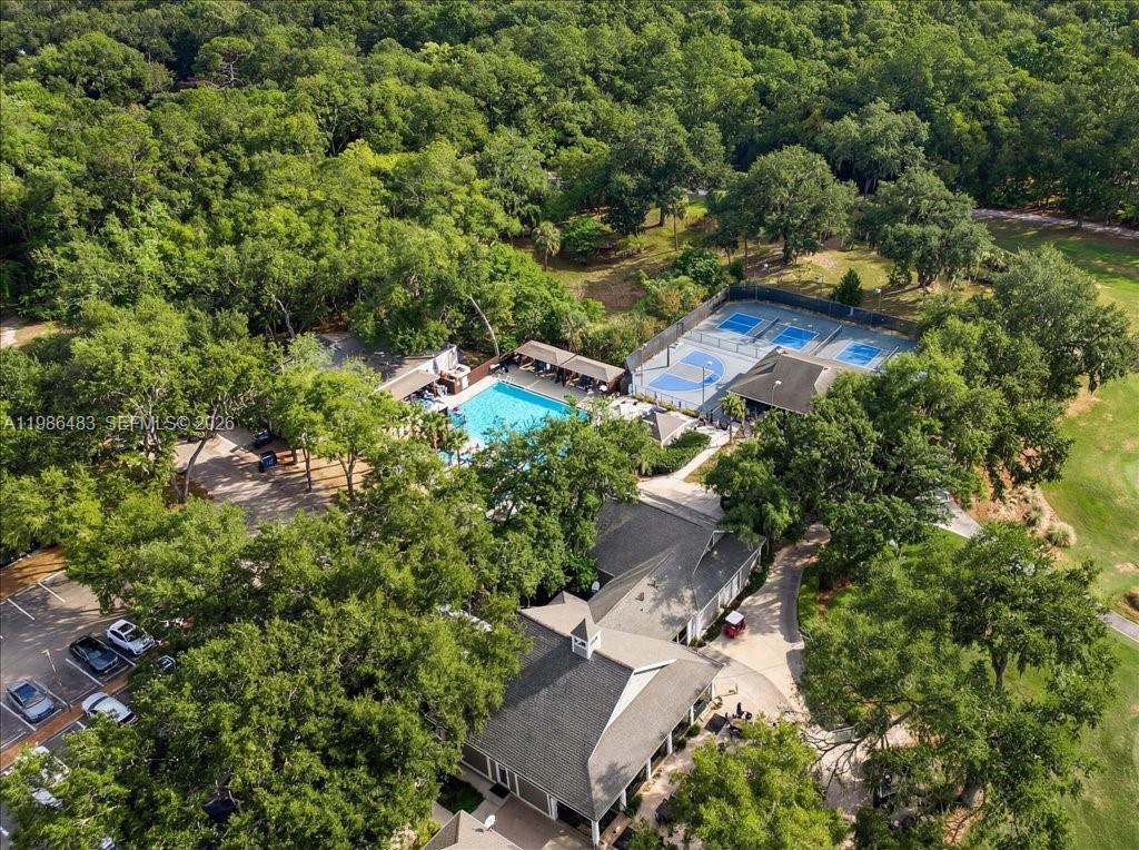 4412 Southwest 101 Drive Gainesville, FL 32608 - Photo 46 of 52 an aerial view of a house with a yard