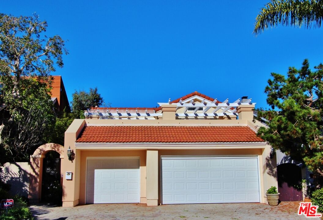 217 Fowling Street Playa del Rey, CA 90293 - Photo 2 of 51 a front view of a house with a garage