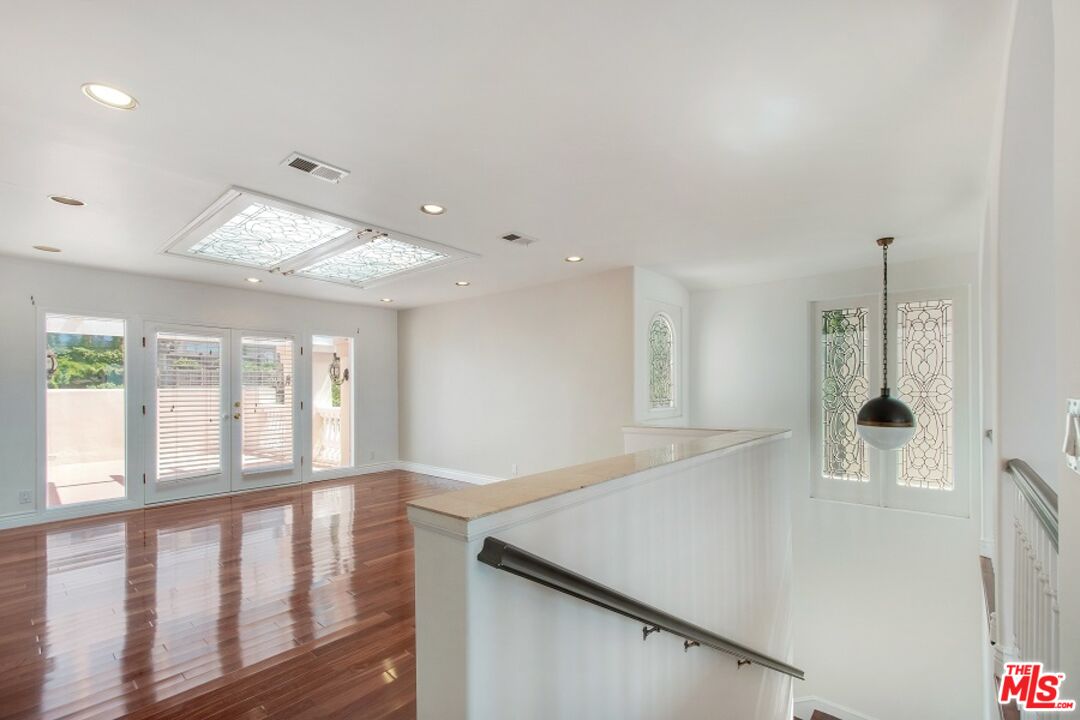 217 Fowling Street Playa del Rey, CA 90293 - Photo 27 of 51 a living room with furniture and a large window