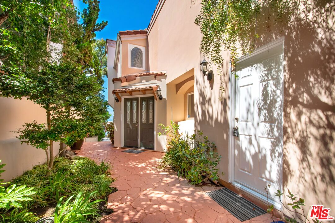 217 Fowling Street Playa del Rey, CA 90293 - Photo 4 of 51 view of a house with a yard