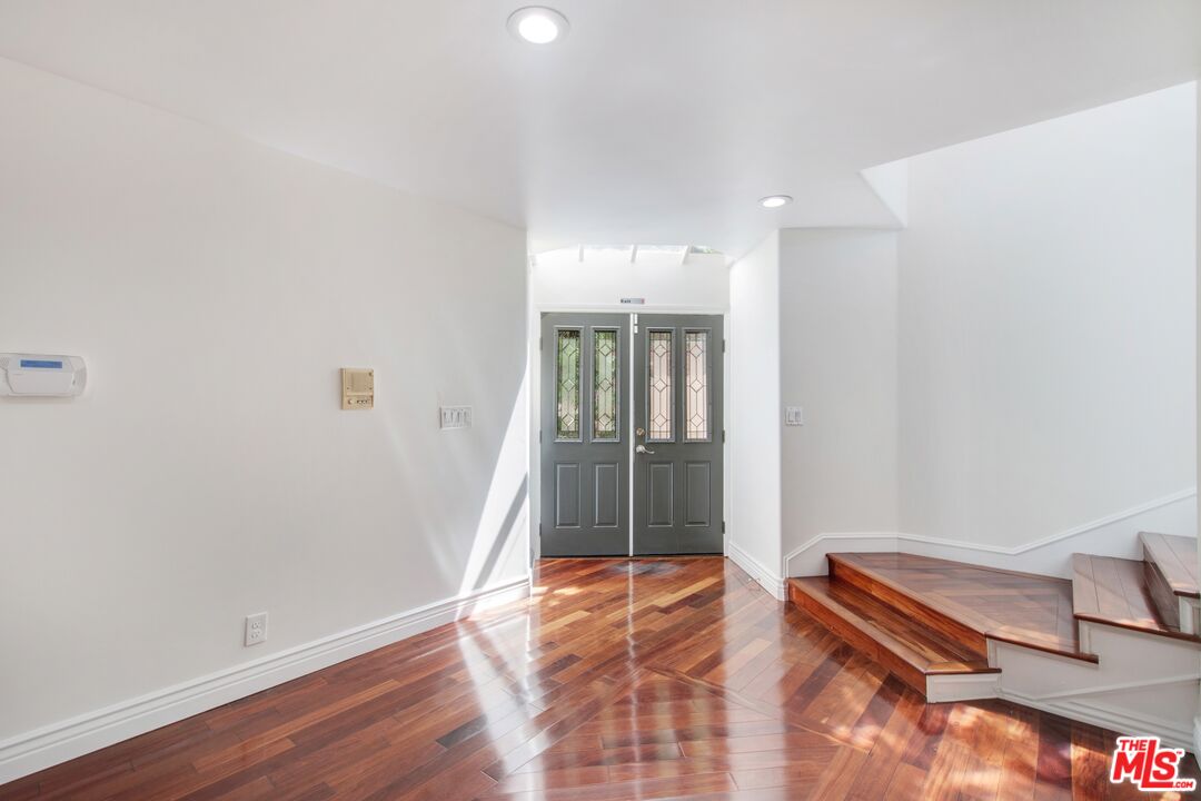 217 Fowling Street Playa del Rey, CA 90293 - Photo 6 of 51 a view of room with window and wooden floor