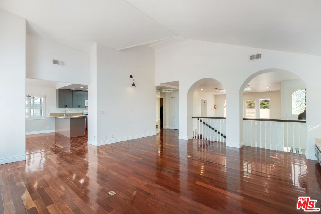 217 Fowling Street Playa del Rey, CA 90293 - Photo 7 of 51 a view of livingroom with kitchen and wooden floor