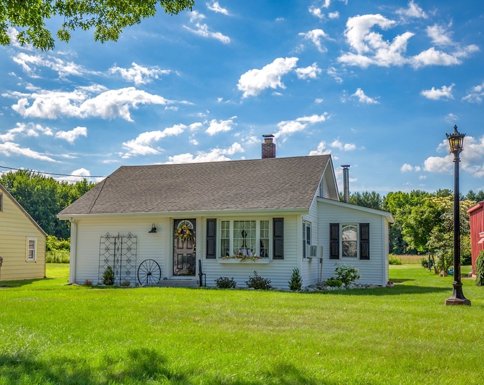 130 Cottage Road Enfield, CT 06082 - Photo 2 of 33 a view of a house with a yard