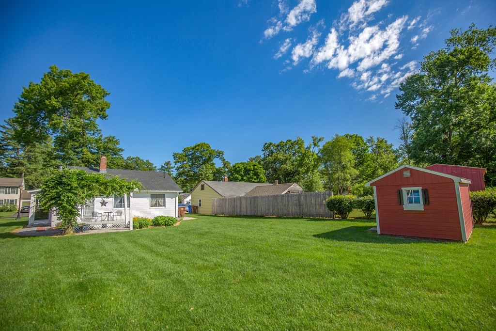 130 Cottage Road Enfield, CT 06082 - Photo 27 of 33 a view of a house with backyard and a tree