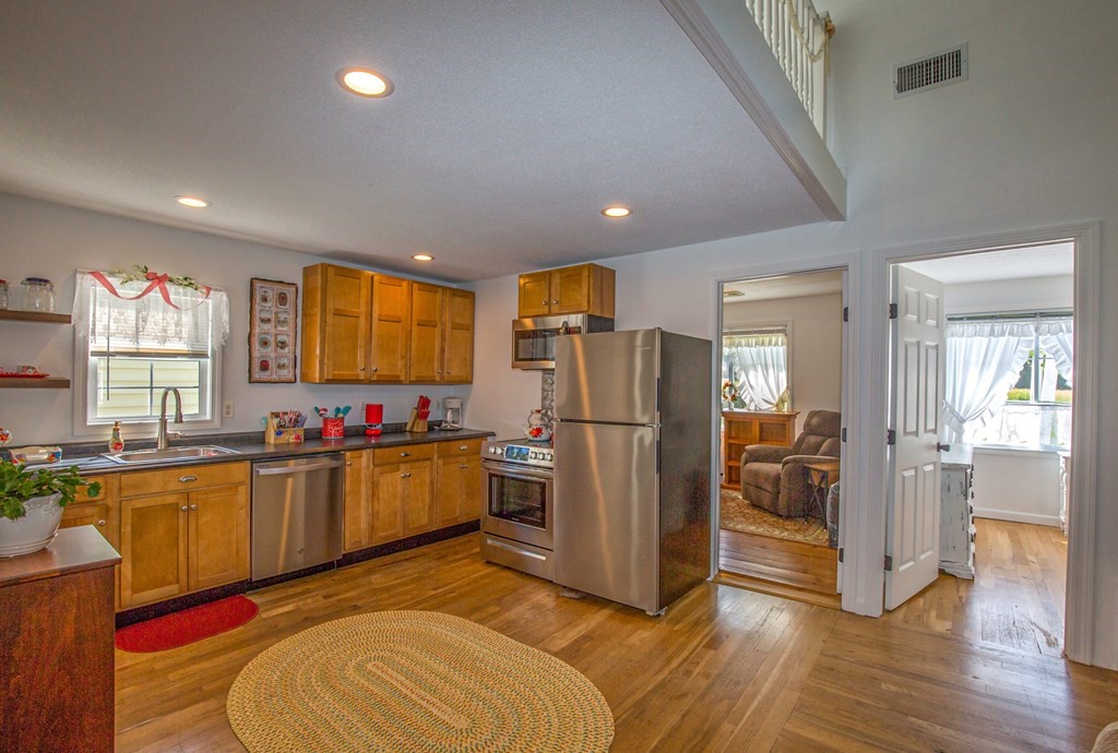 130 Cottage Road Enfield, CT 06082 - Photo 3 of 33 a kitchen with refrigerator and window