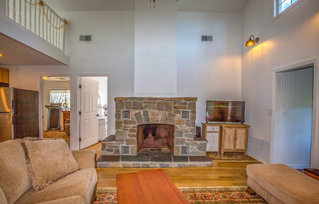 130 Cottage Road Enfield, CT 06082 - Photo 8 of 33 a living room with furniture and a fireplace