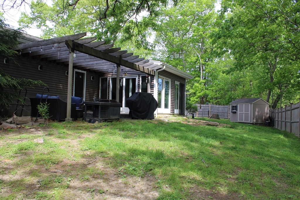 225 Braemoor Road Brockton, MA 02301 - Photo 5 of 29 a view of a house with backyard and a tree