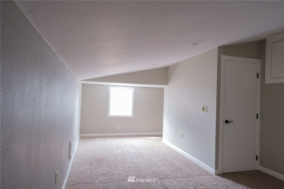 2211 236th Street Southeast Bothell, WA 98021 - Photo 21 of 26 a view of empty room with window
