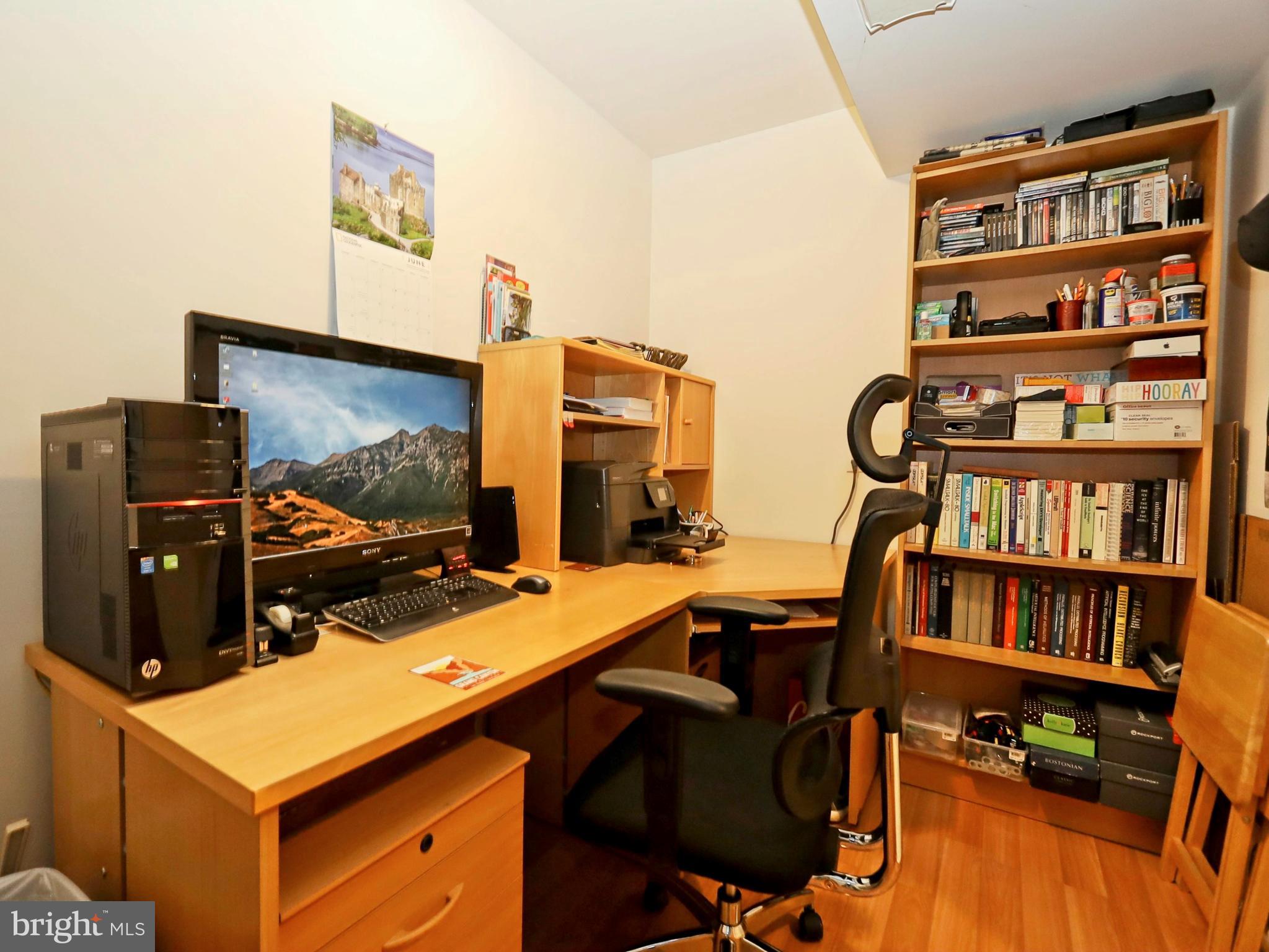 11037 Solaridge Drive Reston, VA 20191 - Photo 20 of 45 Computer tables and cabinet convey