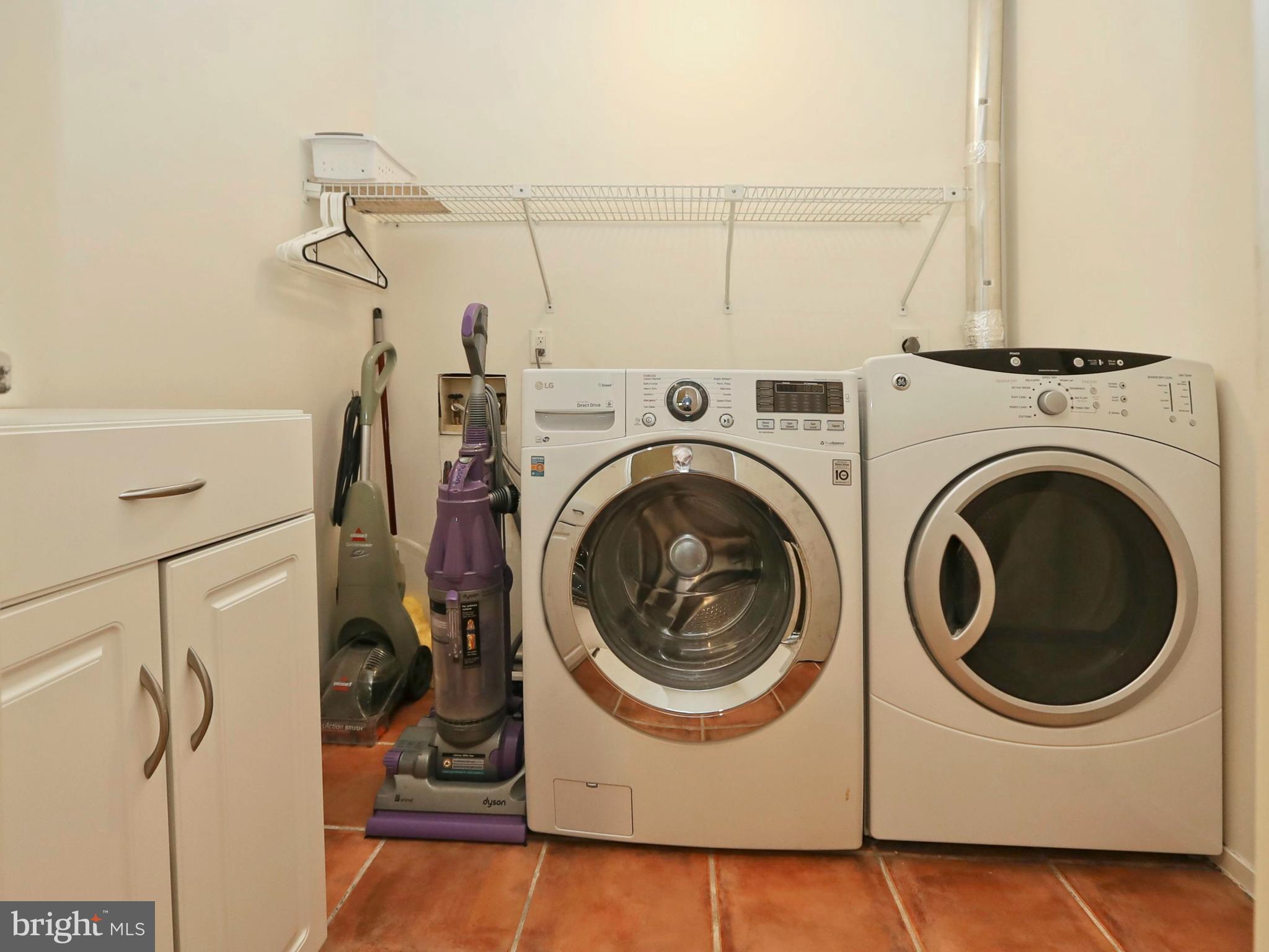 11037 Solaridge Drive Reston, VA 20191 - Photo 28 of 45 Upper level laundry with cabinet