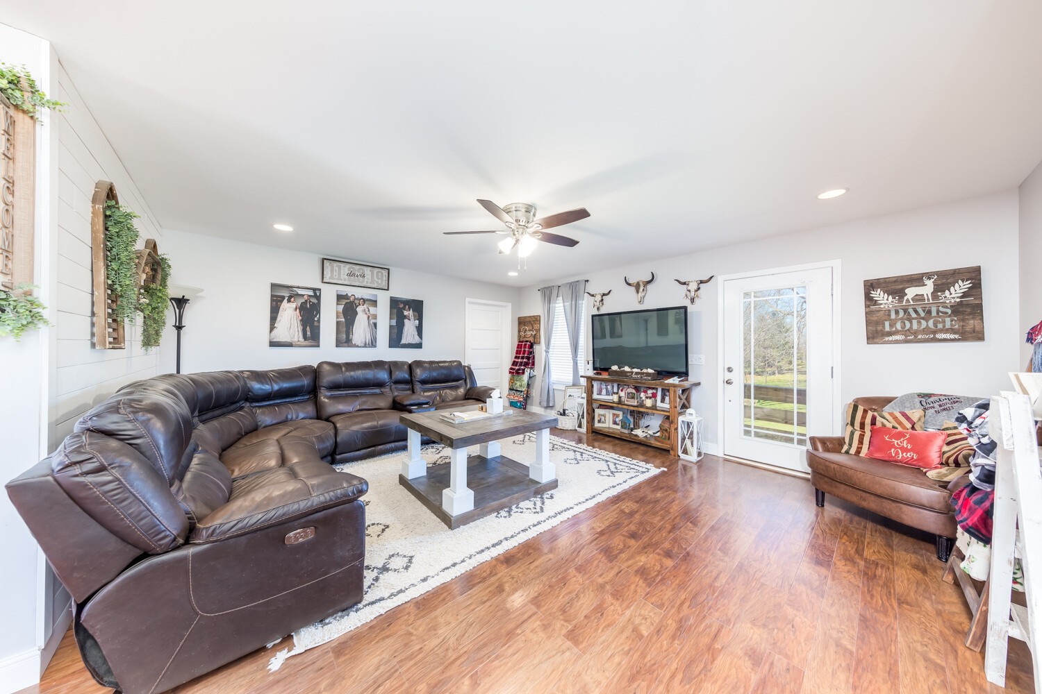 530 Lower Helton Road Alexandria, TN 37012 - Photo 15 of 24 a living room with furniture flat screen tv and a fireplace