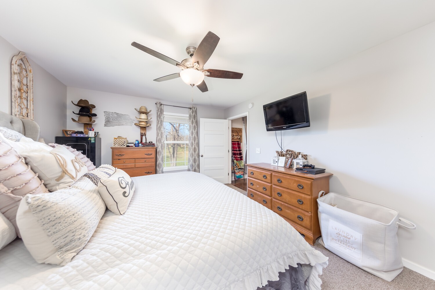 530 Lower Helton Road Alexandria, TN 37012 - Photo 16 of 24 a bedroom with a bed and a flat screen tv