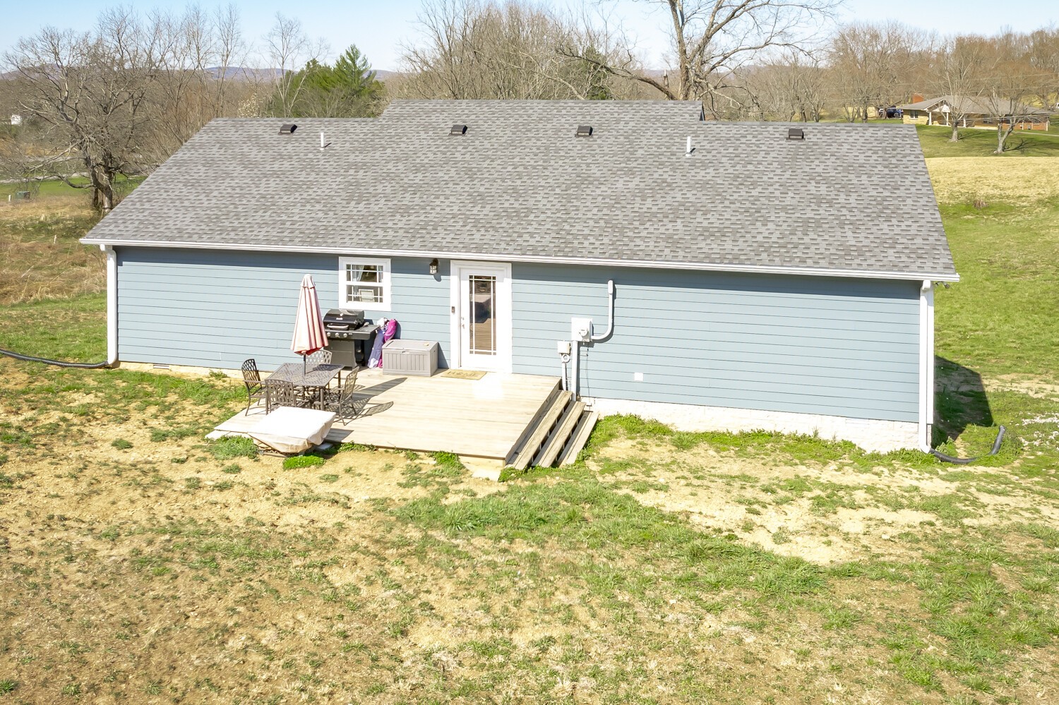 530 Lower Helton Road Alexandria, TN 37012 - Photo 2 of 24 a view of a house with pool and a yard