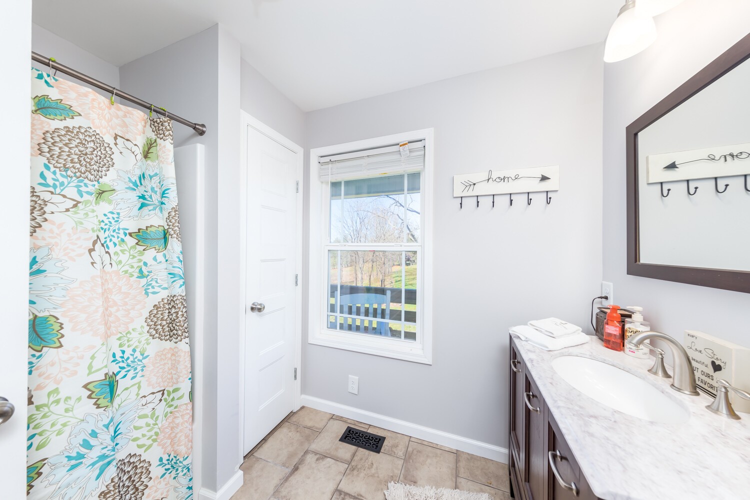 530 Lower Helton Road Alexandria, TN 37012 - Photo 22 of 24 a bathroom with a sink and a window