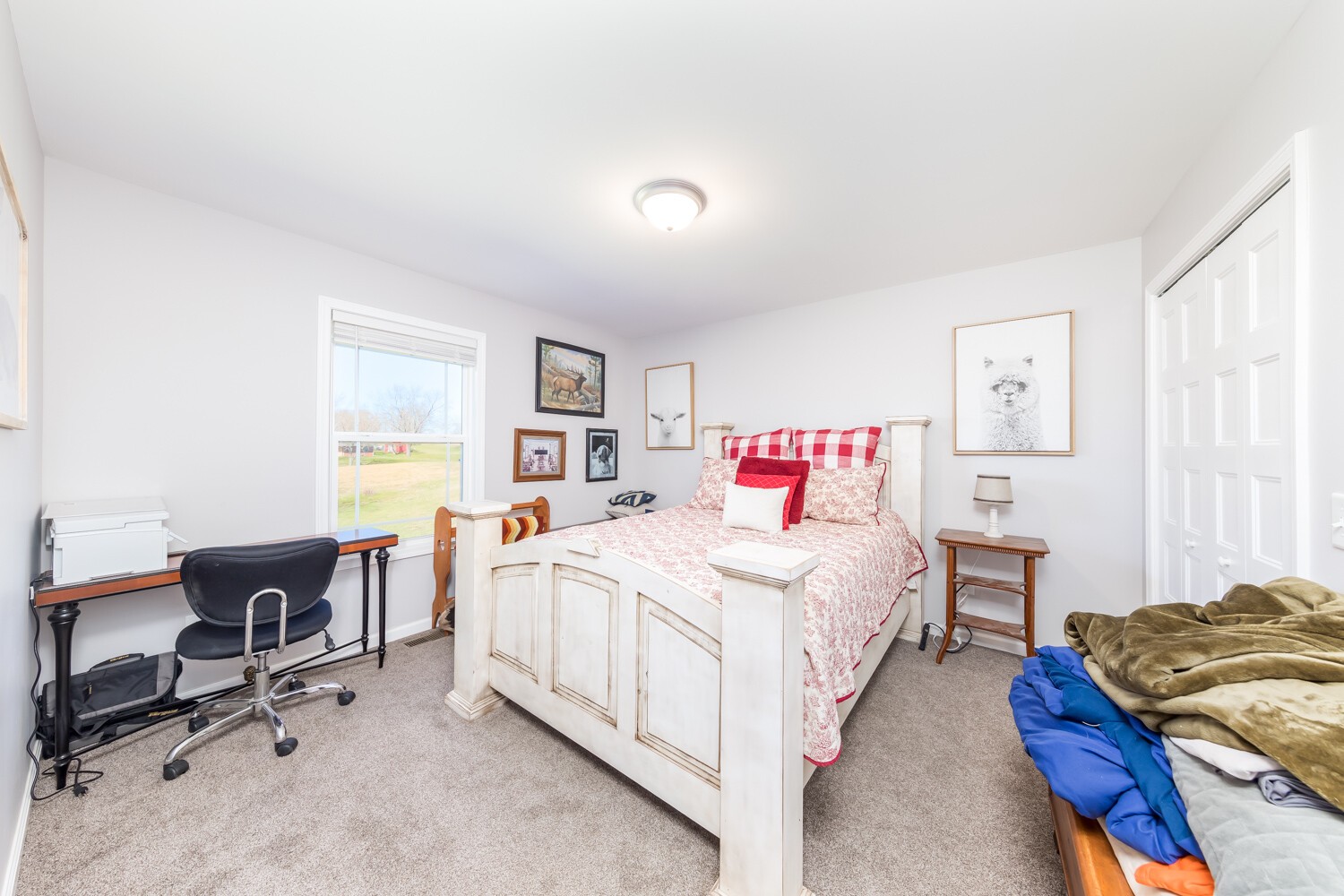 530 Lower Helton Road Alexandria, TN 37012 - Photo 24 of 24 a bedroom with a bed and a desk