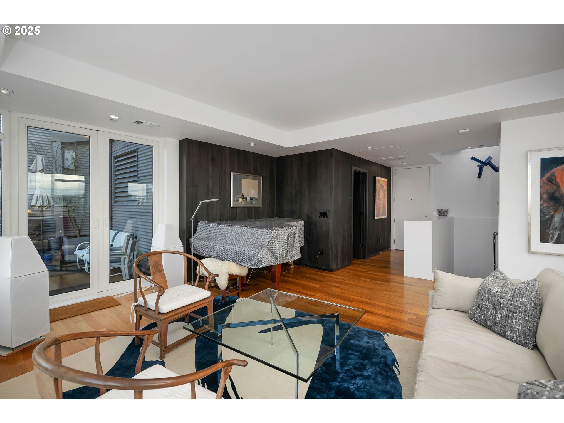 300 Northwest 8th Avenue, Unit 902 Portland, OR 97209 - Photo 15 of 46 a living room with furniture and a table