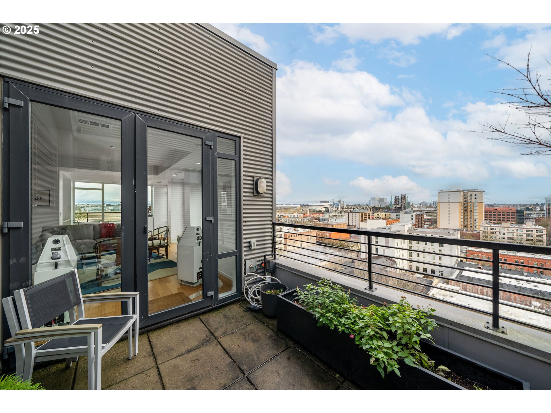 300 Northwest 8th Avenue, Unit 902 Portland, OR 97209 - Photo 16 of 46 a view of a terrace with furniture