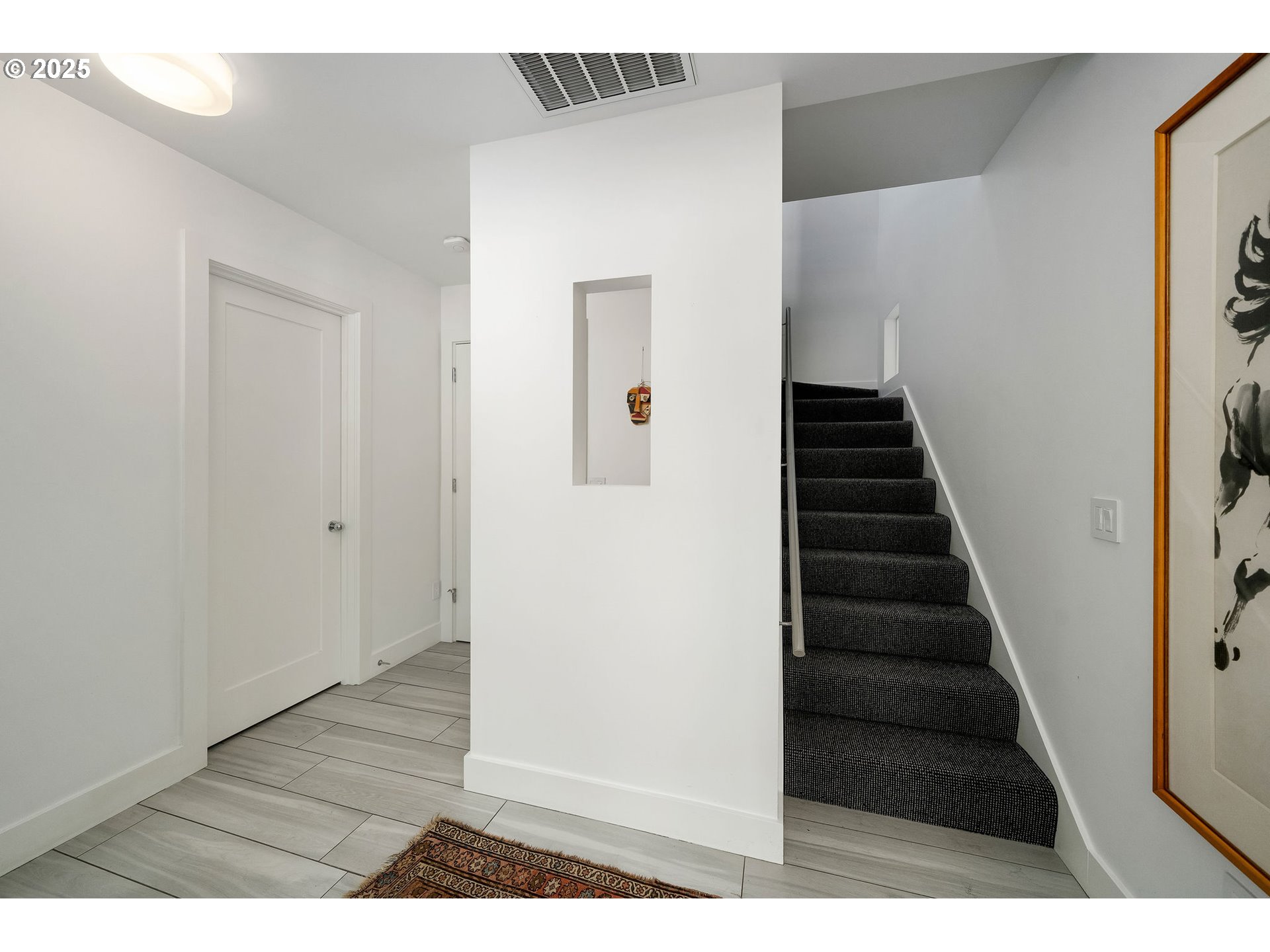 300 Northwest 8th Avenue, Unit 902 Portland, OR 97209 - Photo 22 of 46 a view of a hallway with wooden floor and entryway