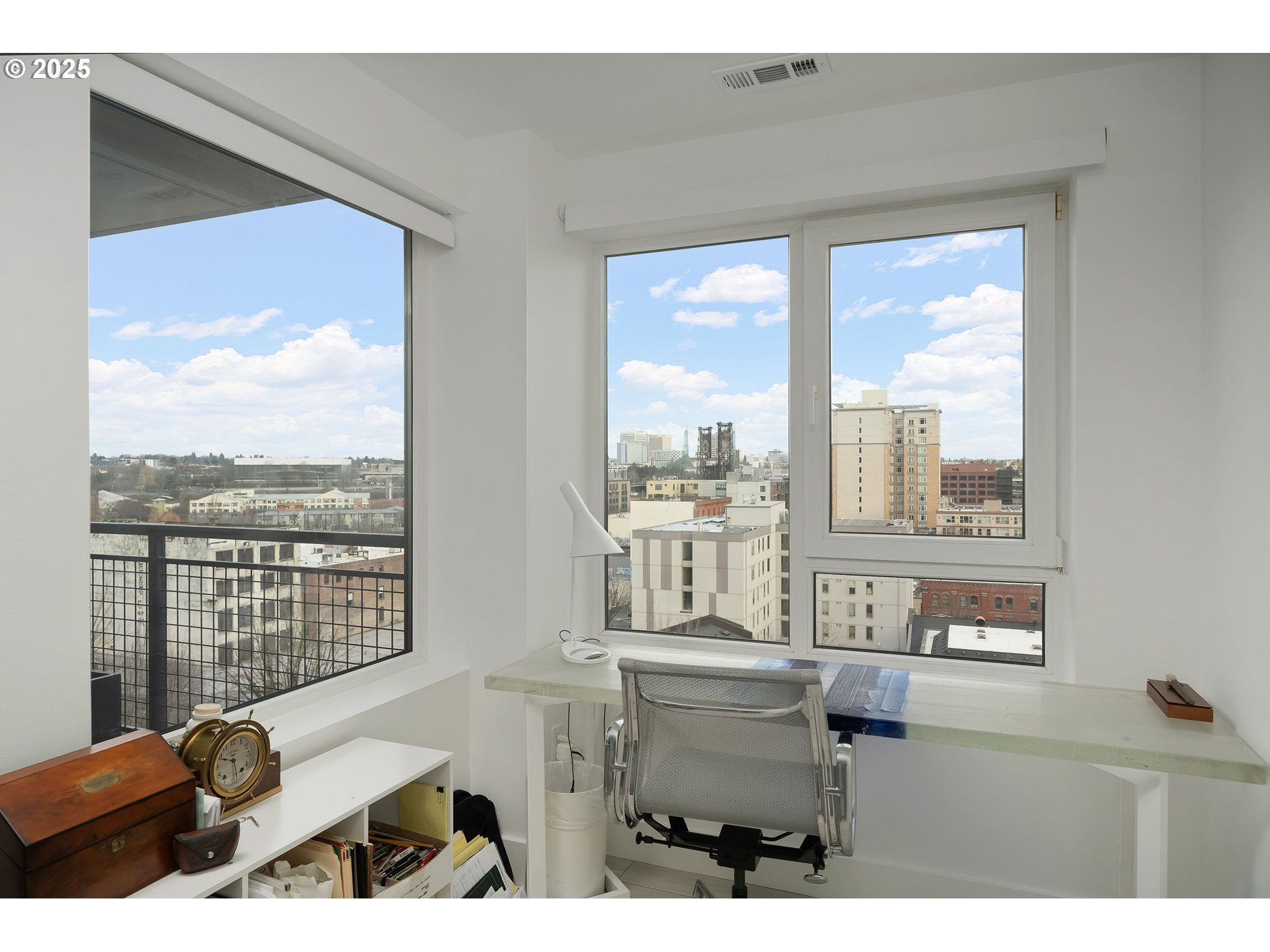 300 Northwest 8th Avenue, Unit 902 Portland, OR 97209 - Photo 25 of 46 a picture of a floor to ceiling window and an outdoor view