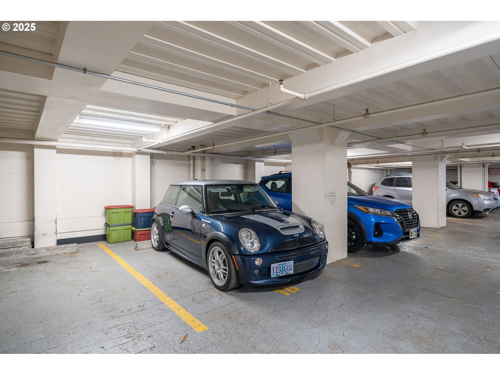 300 Northwest 8th Avenue, Unit 902 Portland, OR 97209 - Photo 36 of 46 a car parked in a garage
