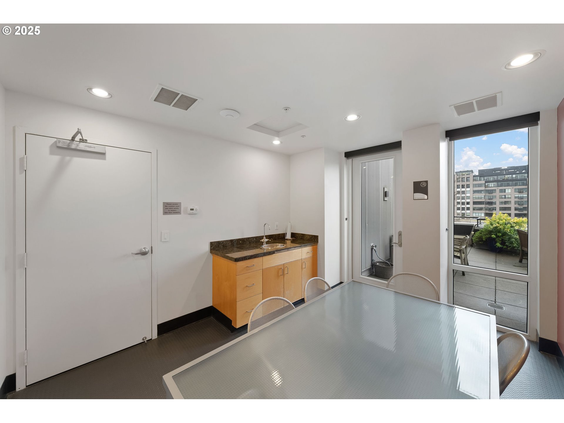 300 Northwest 8th Avenue, Unit 902 Portland, OR 97209 - Photo 39 of 46 a kitchen with a refrigerator and a stove