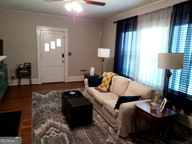a view of livingroom with hardwood floor and window