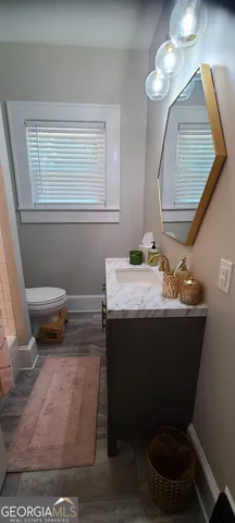 a kitchen with a stove and a microwave