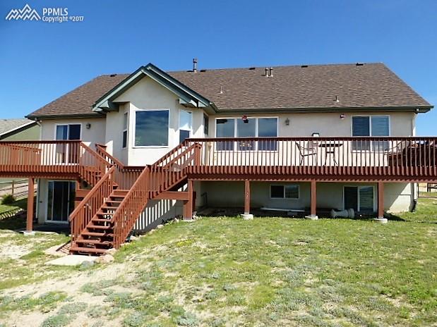 9456 Rockingham Drive Peyton, CO 80831 - Photo 3 of 7 2 Decks, Walk Out Basement