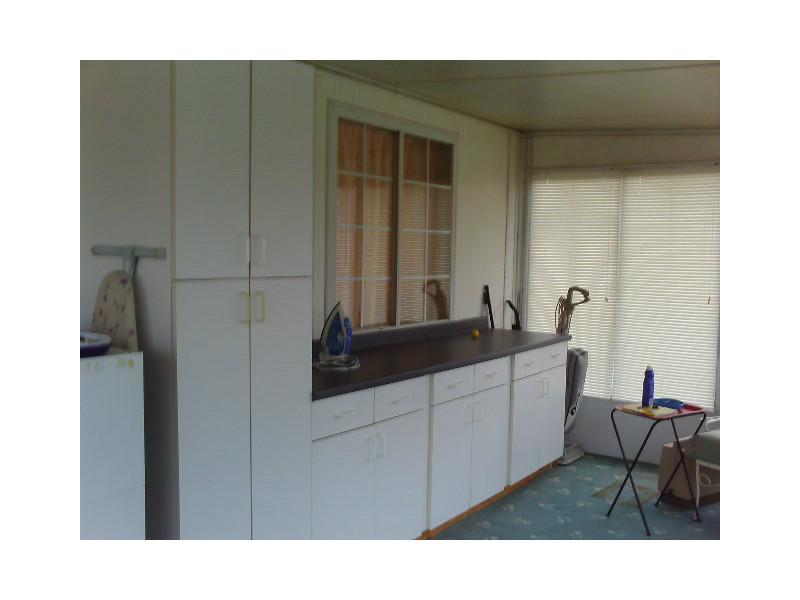 116 Hoy Street Rices Landing, PA 15357 - Photo 8 of 11 Sunroom. Glass enclosed sun room with storage!