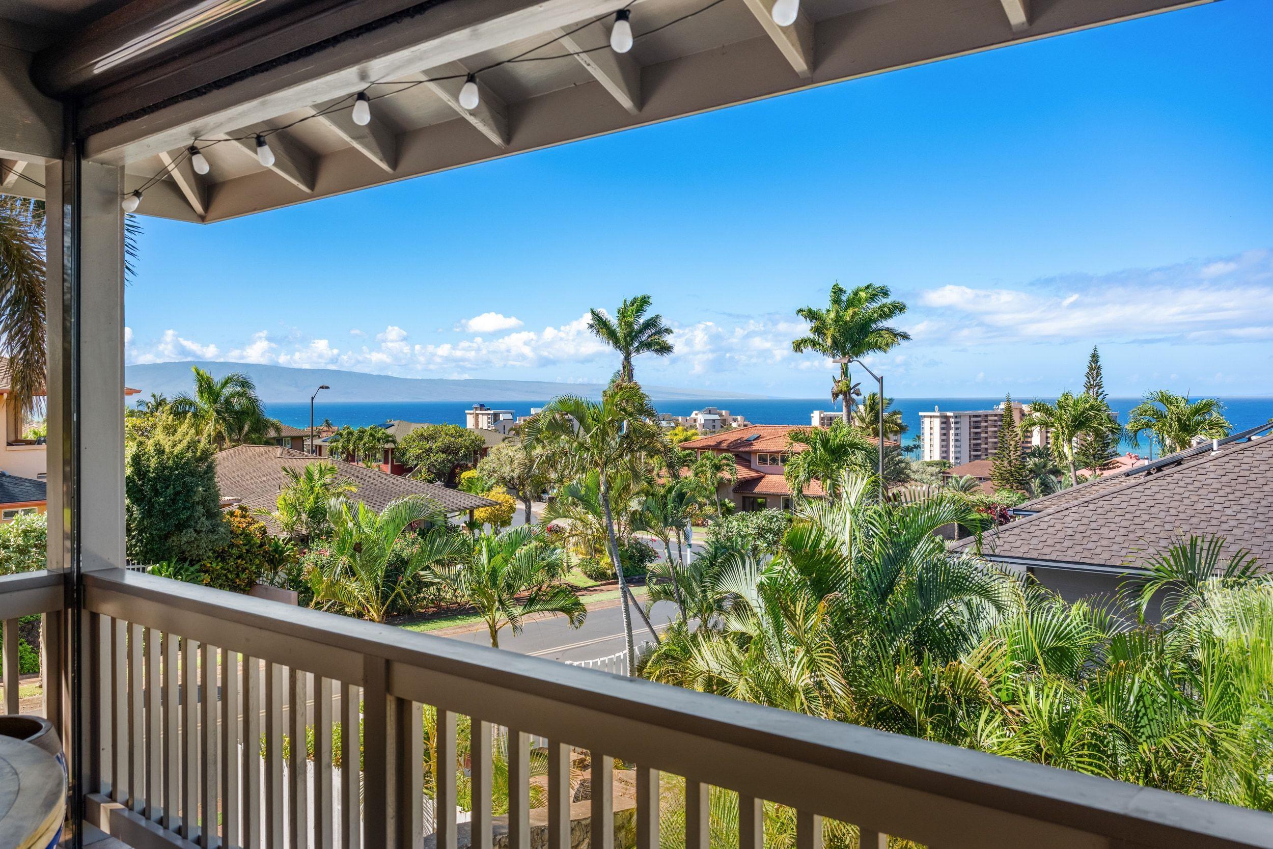 125 Kahana Makai Road Lahaina, HI 96761 - Photo 13 of 46 a view of a balcony with flower plants