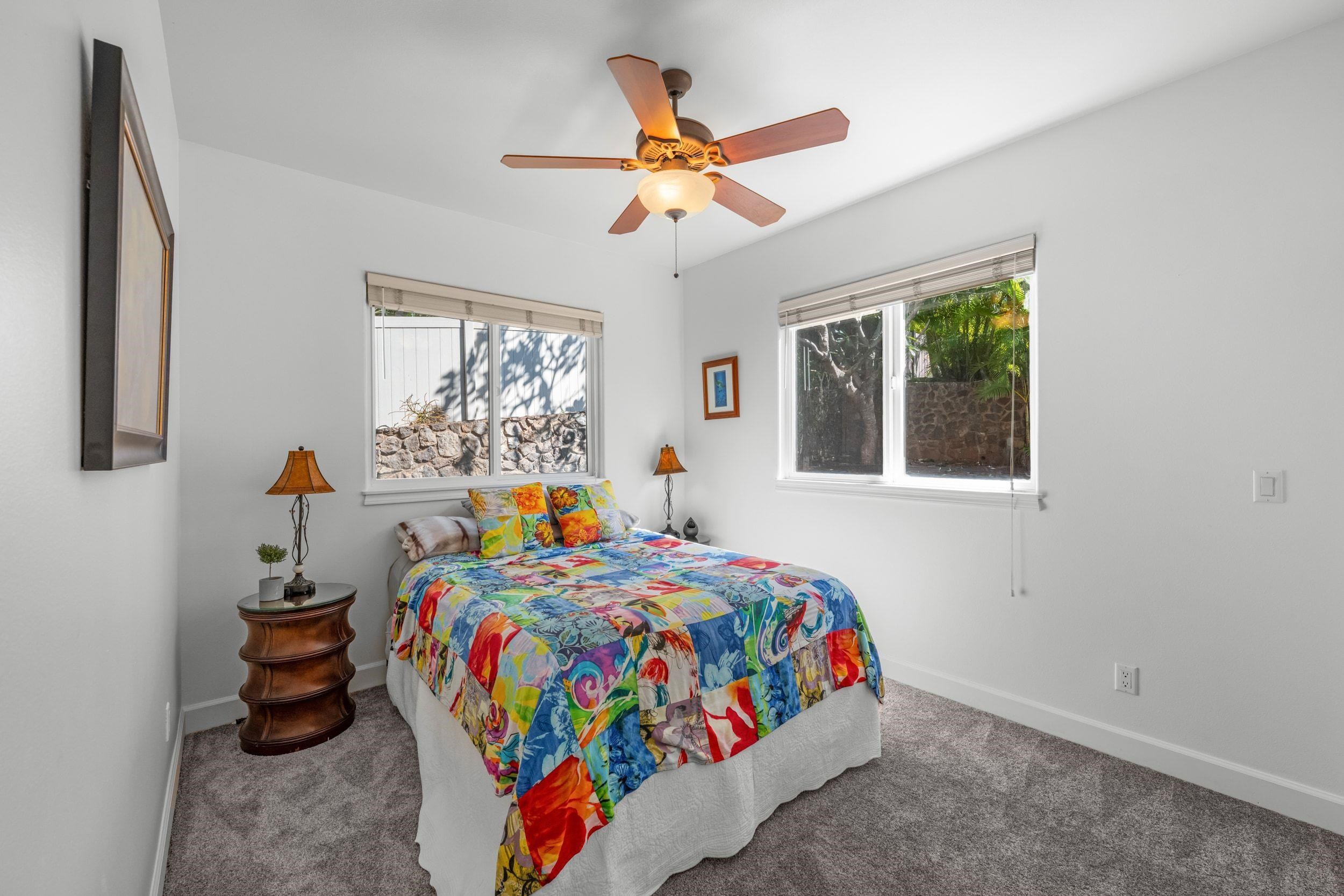 125 Kahana Makai Road Lahaina, HI 96761 - Photo 34 of 46 a bedroom with bed and a window