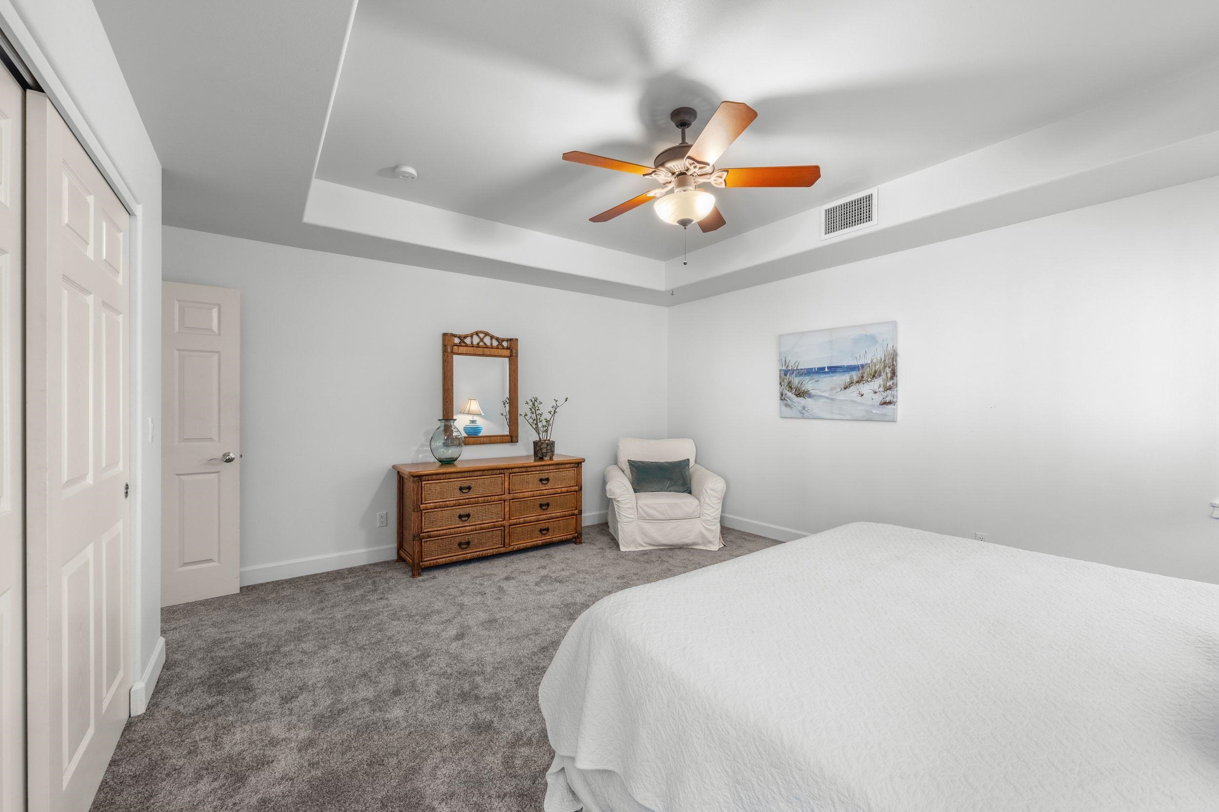 125 Kahana Makai Road Lahaina, HI 96761 - Photo 37 of 46 a bedroom with a bed and a chandelier