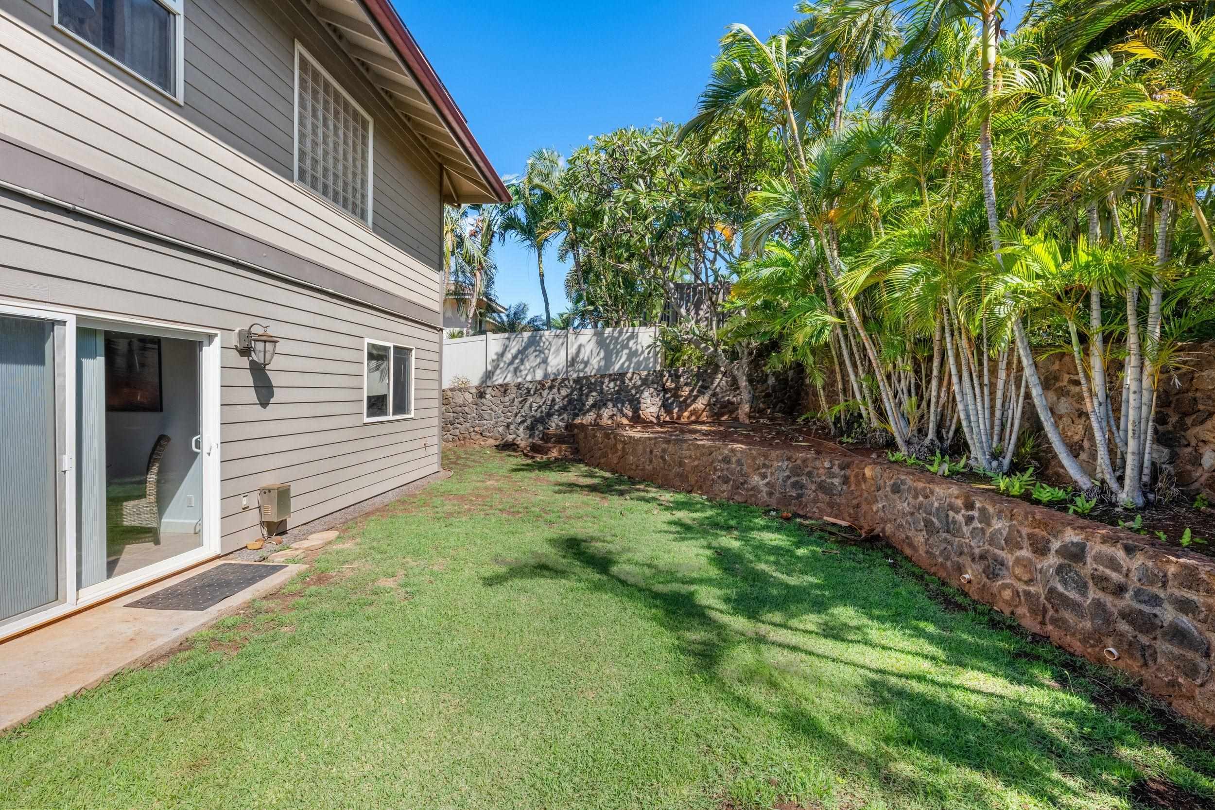 125 Kahana Makai Road Lahaina, HI 96761 - Photo 43 of 46 a view of a backyard with plants and large trees