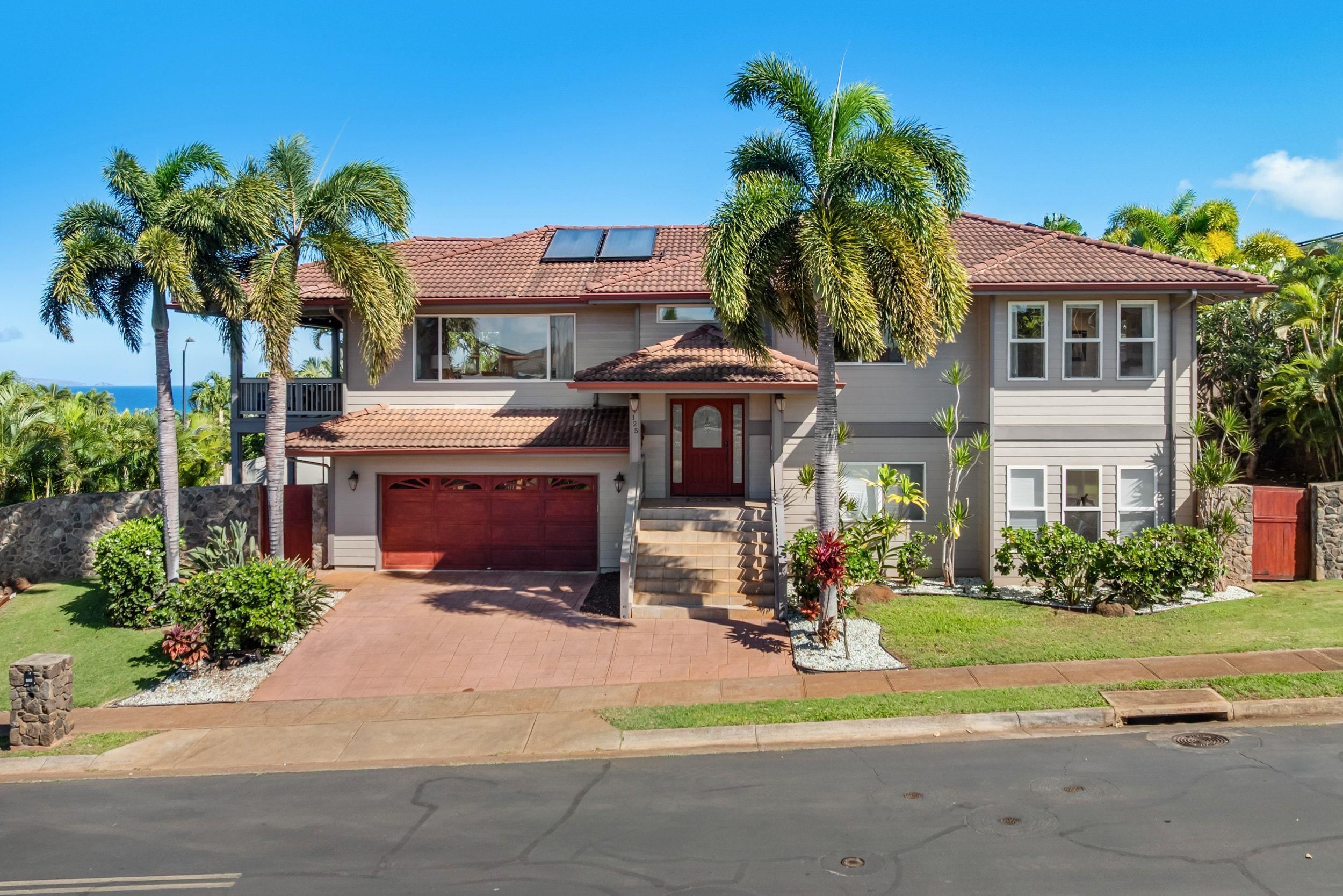 125 Kahana Makai Road Lahaina, HI 96761 - Photo 44 of 46 a view of a house with a yard and potted plants