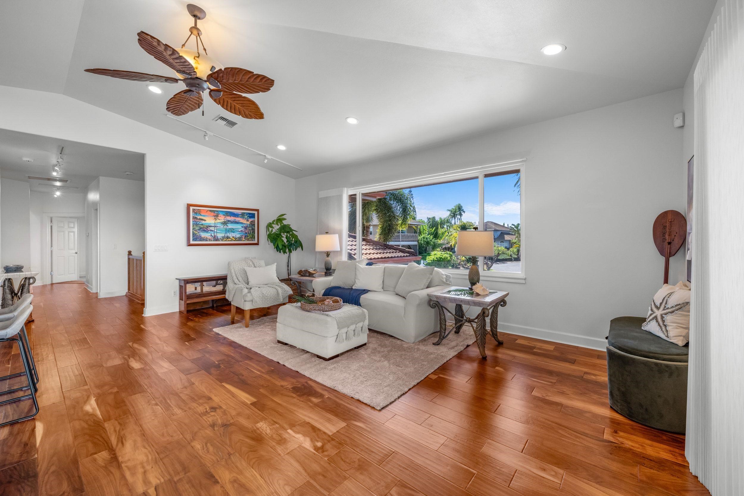 125 Kahana Makai Road Lahaina, HI 96761 - Photo 9 of 46 a living room with furniture a window and a ceiling fan