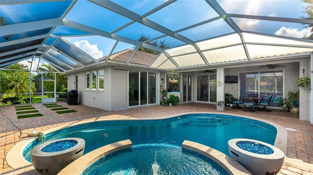 a view of swimming pool in the backyard