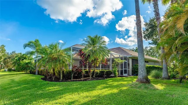 a view of a trees in front of a house