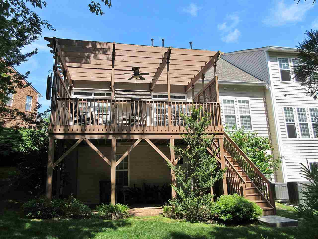 3920 Sunset Maple Court, Unit LOT 026 Raleigh, NC 27612 - Photo 22 of 30 View of Deck and Pergola from rear of Unit. Exterior Deck