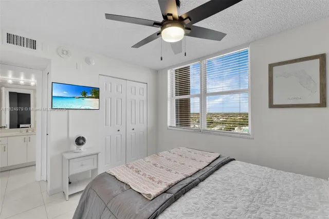 a bathroom with a shower and a toilet