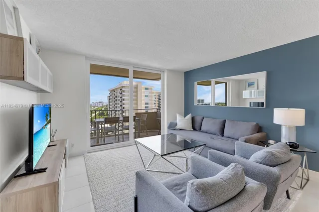 a view of an ocean and city