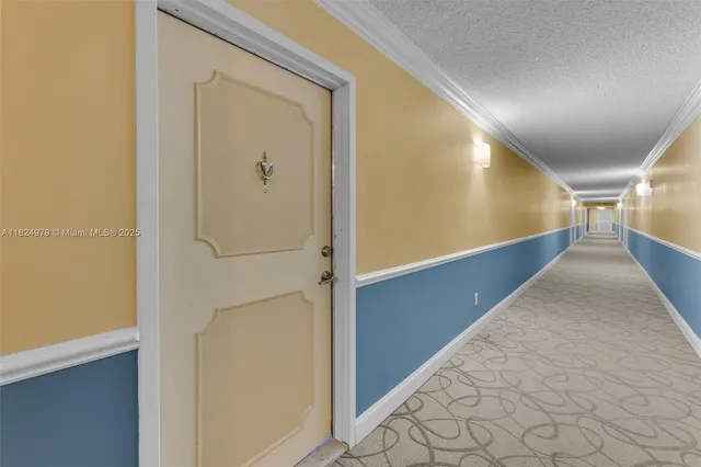 a balcony with view of living room