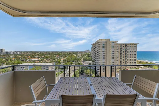 a view of a balcony with city view